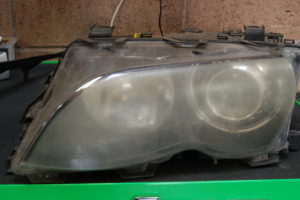 This is a headlamp on a 2003 BMW 3-series prior to lens placement.